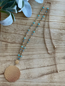 Gold Disc Pendant Necklace with Gold and Blue Beads
