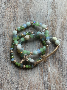 Cross Stretch Bracelet with Green, Blue, and Cream Beads